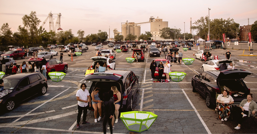 A Tailgating afternoon, multiple people have a set with their friends