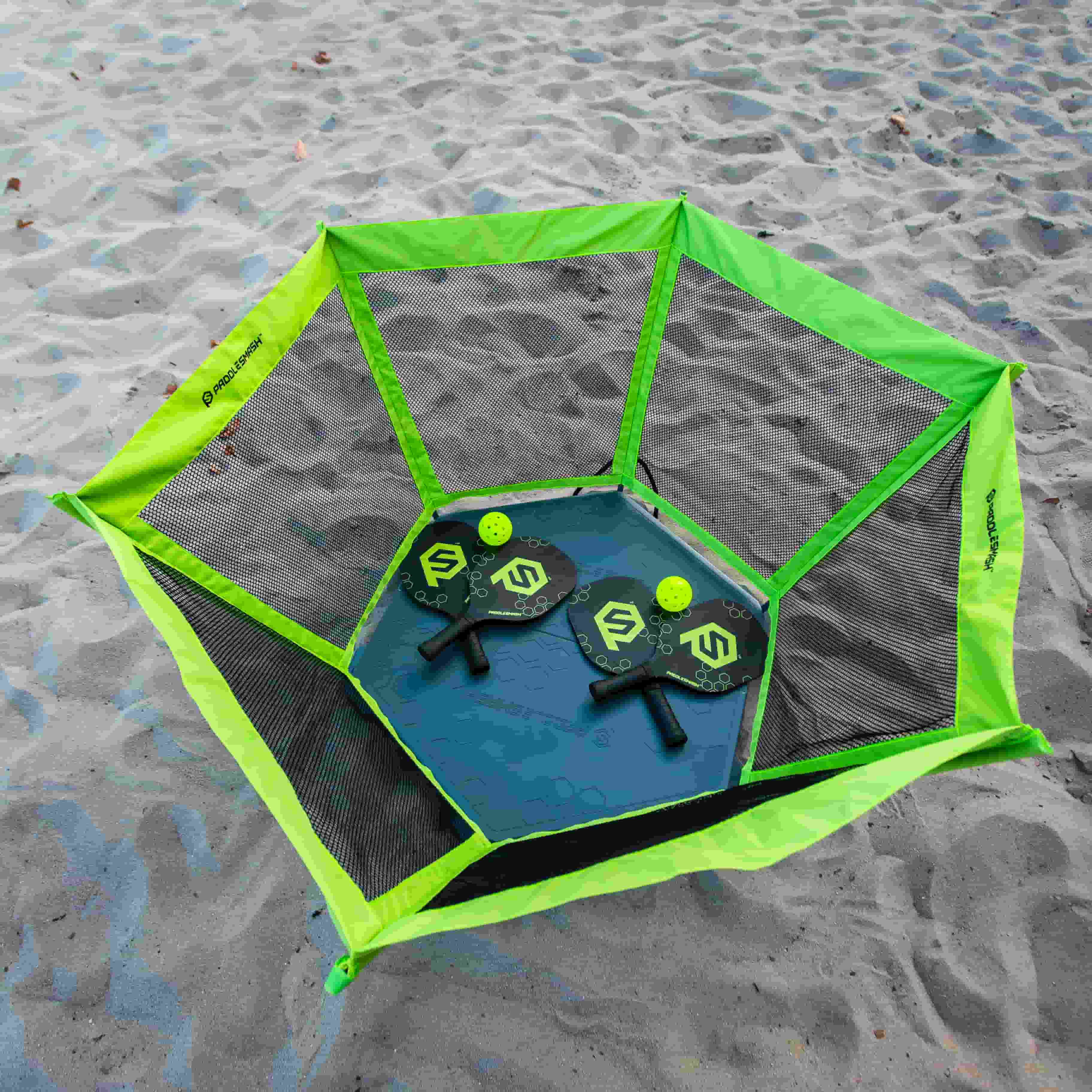  PaddleSmash set up on the beach, net paddles and balls