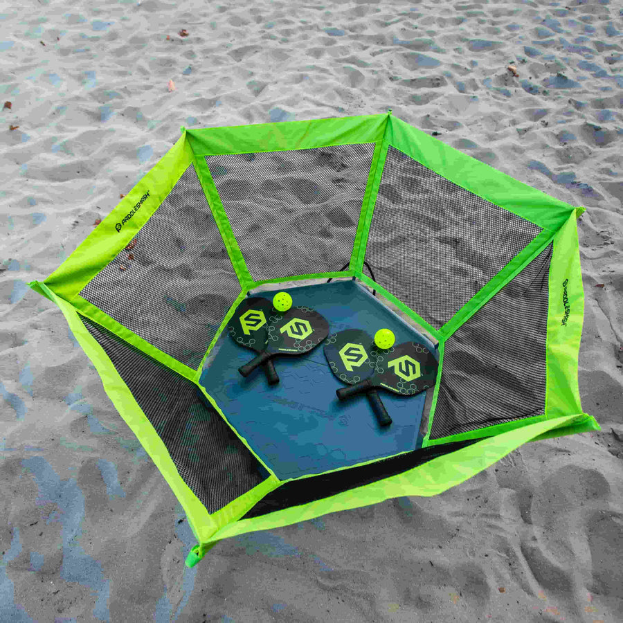  PaddleSmash set up on the beach, net paddles and balls