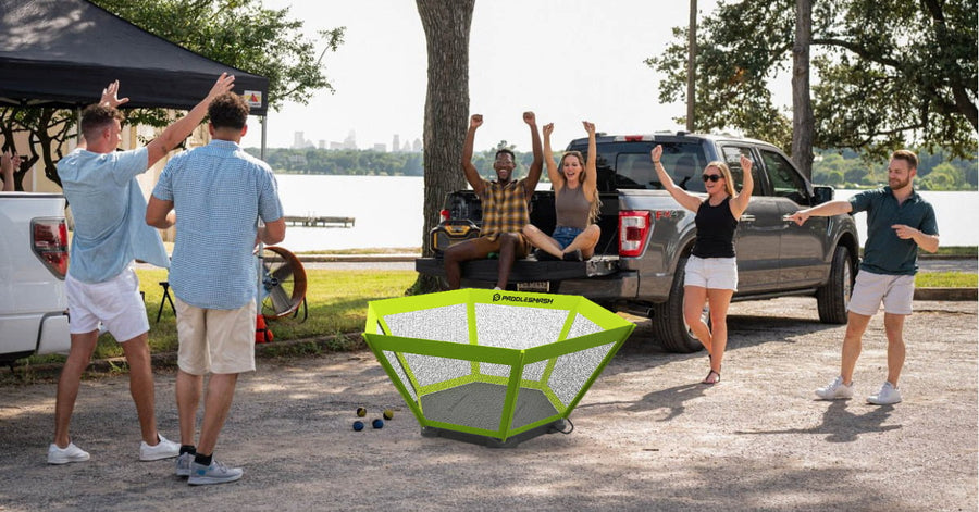 A group of happy friends excited to play PaddleSmash and tailgate